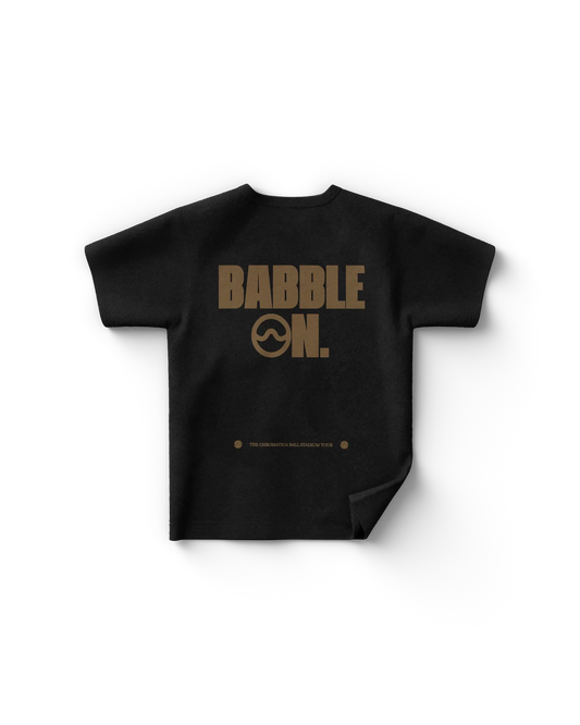 Black Lady Gaga merch t shirt back view with bold text "BABBLE ON" and small text "THE CHROMATICA BALL STADIUM TOUR"