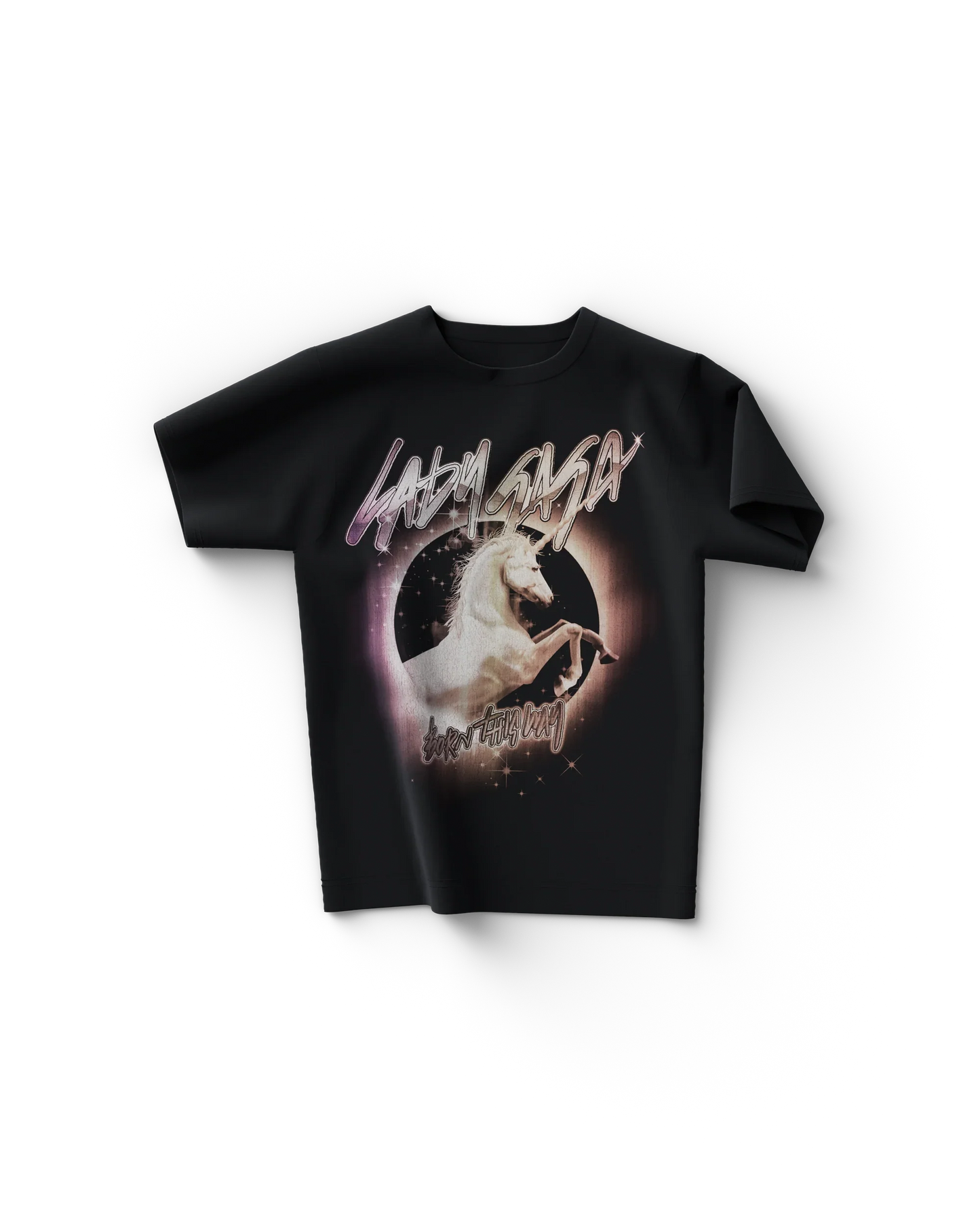 Black Lady Gaga merch t shirt front view with glowing unicorn graphic and text "Lady Gaga Born This Way" in stylized script