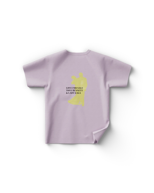Light pastel Lady Gaga t shirt back view featuring yellow silhouette artwork and “Love For Sale Tony Bennett & Lady Gaga” text, classic Gaga merch style