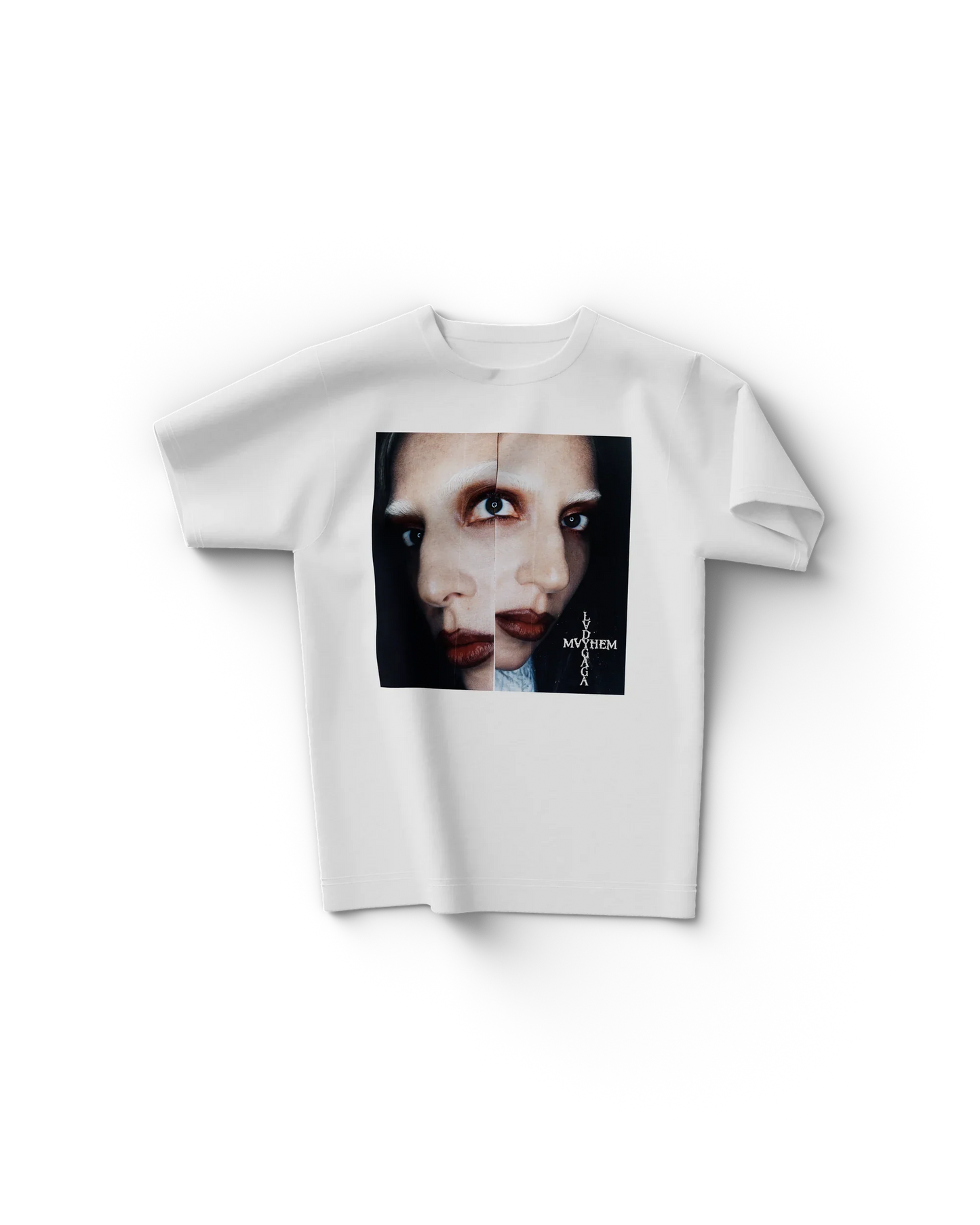 White Lady Gaga t shirt front view with mirrored dual face portrait graphic and small vertical text "Lady Gaga Mayhem"