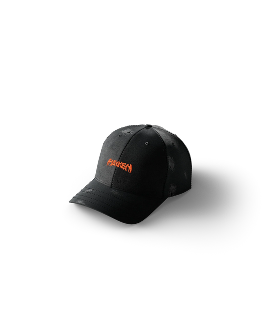 Lady Gaga black MAYHEM hat featuring orange embroidered “MAYHEM” logo on distressed black baseball cap