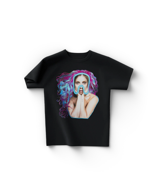 Black Lady Gaga merch t shirt front view with colorful portrait featuring blue mask and vibrant pink and blue hair