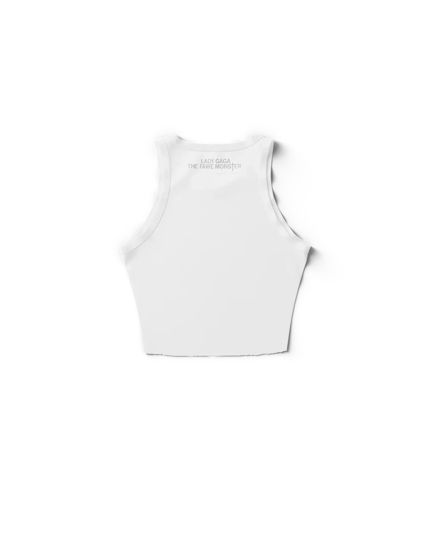 White Lady Gaga tank top back view with subtle “The Fame Monster” text near neckline, clean minimalist Gaga merch design