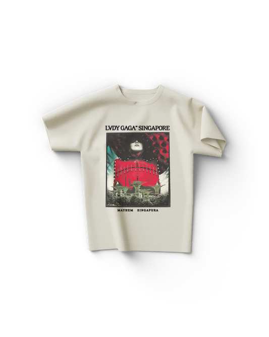 Cream Lady Gaga t shirt front view with vintage poster-style graphic featuring Gaga portrait and “LVDY GAGA SINGAPORE” text, bold Mayhem Singapura tour merch design