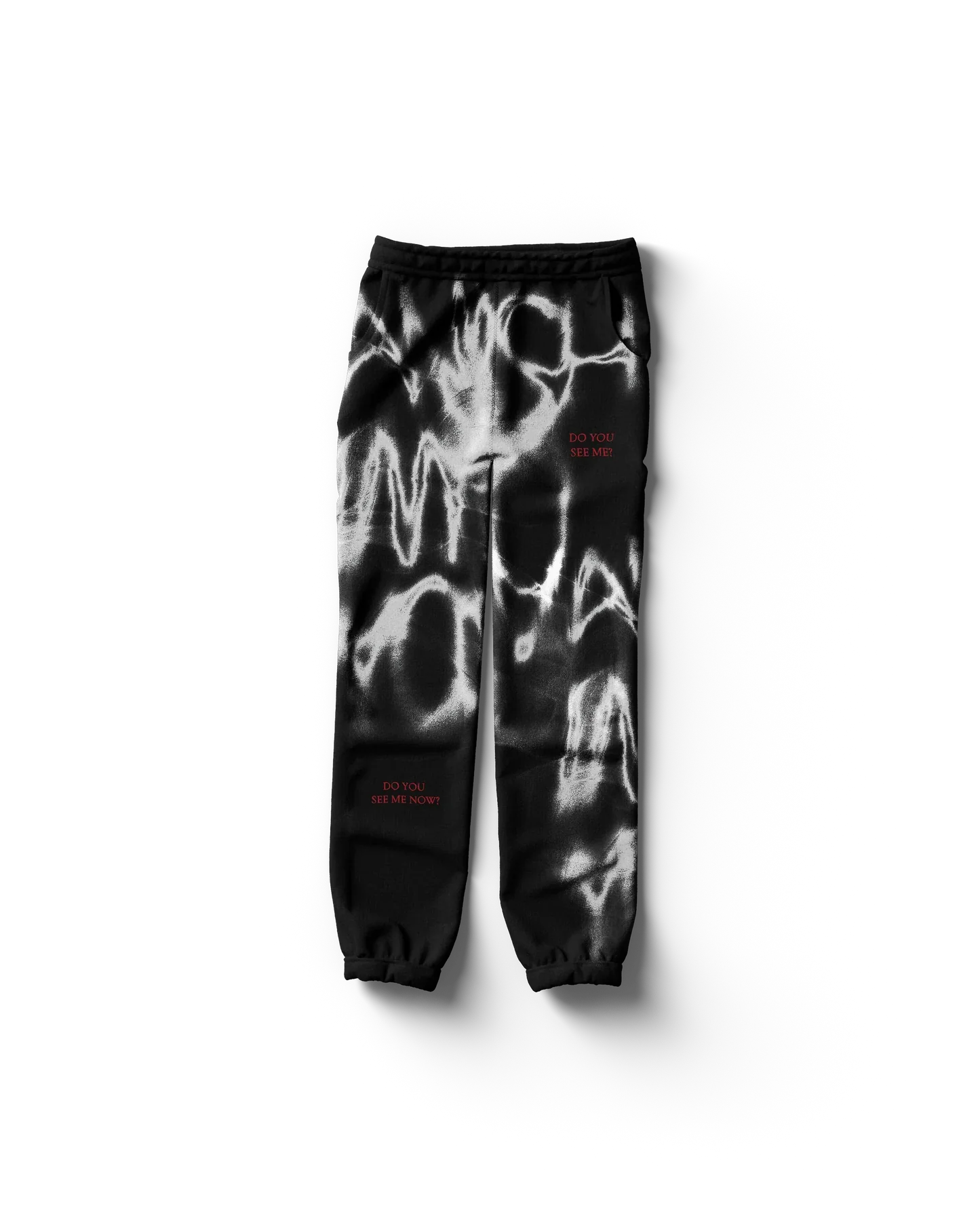 Black Lady Gaga merch sweatpants front view with abstract white graffiti pattern and red “Do You See Me” text, edgy Gaga streetwear design