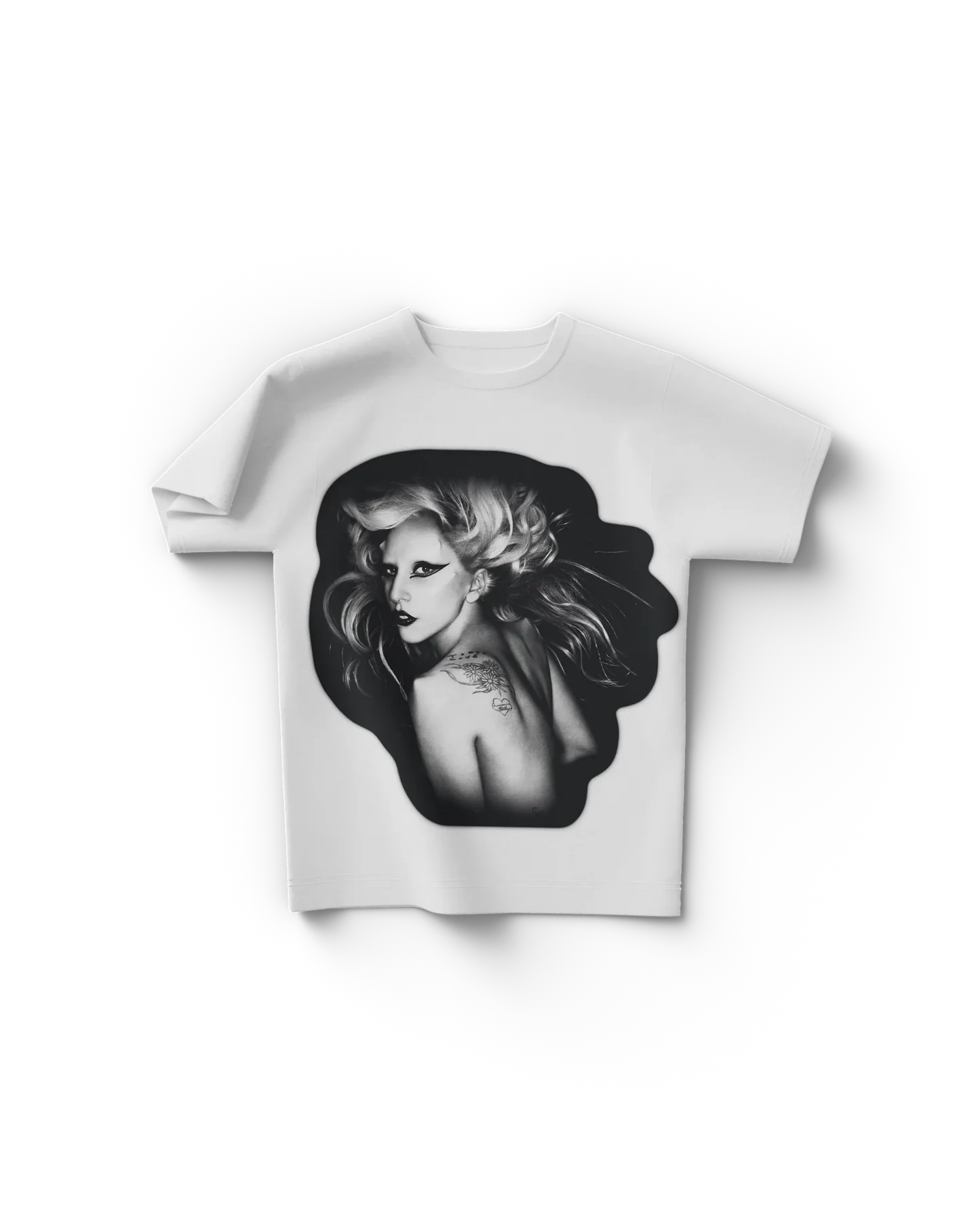 White Lady Gaga merch t shirt front view with black and white portrait featuring flowing hair and shoulder tattoo detail